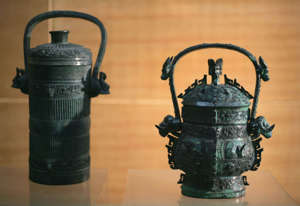 BAOJI, CHINA - MAY 24:  Bronze vessels from Zhou Dynasty are displayed at the Baoji Bronze Museum on May 24, 2005 in Baoji of Shaanxi Province, China. Considered the birthplace of Chinese culture and civilization, Shaanxi Province was home to dynasties from Zhou (1027 to 221 BC) to Tang (AD 618-907), and remains an important destination for archaeologists due to large quantities of cultural relics and historic remains yet to be excavated. (Photo by Andrew Wong/Getty Images)