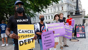 Student loan debt holders take part in a demonstration outside of the White House staff entrance to demand that President Biden cancel student loan debt in August on July 27, 2022 at the Executive Offices in Washington, D.C.