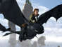 In this file film publicity image released by Paramount Pictures, Hiccup, voiced by Jay Baruchel, rides Toothless in a scene from “How to Train Your Dragon.”
