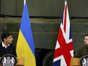 Britain's Prime Minister Rishi Sunak, left, and Ukrainian President Volodymyr Zelensky during a press conference at a military facility, in Lulworth, Dorset, England, Wednesday Feb. 8, 2023. Andrew Matthews/AP