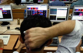 Nifty crosses briefly, closes with