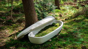 A Living Cocoon coffin and an EarthRise urn made by Dutch startup company Loop Biotech. The coffins are made from biodegradable mushroom and hemp fibers.