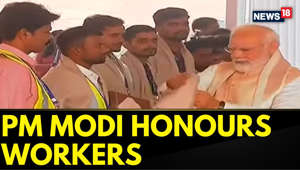 PM Narendra Modi Felicitates Workers Involved In The Construction Of The New Parliament Building