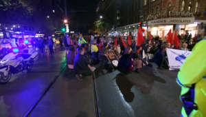 A thousand people have stopped traffic on a march through the heart of Adelaide in opposition to the state government's crackdown on disruptive protests. The new law has been condemned by dozens of community and civil rights groups and crossbench MPs are considering how to amend the bill or stop it from passing.