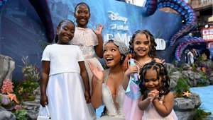 LONDON, ENGLAND - MAY 15: Halle Bailey with young fans at the UK Premiere of Disney's "The Little Mermaid" on May 15, 2023 in London, England. (Photo by Kate Green/Getty Images for Disney)