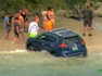 Woman arrested after driving down beach in US