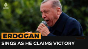 Erdogan sings after claiming election victory