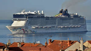 Crowded cruise ships setting sail