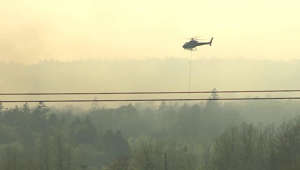 Helicopters dump water on wildfire in Bedford, N.S.