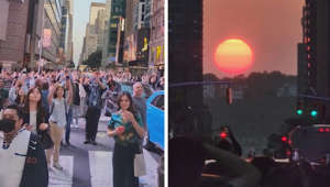 New Yorkers gather in the streets for rare Manhattanhenge sunset