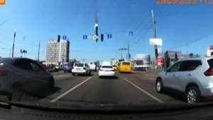 Watch: Dashcam captures missile falling on busy Kyiv highway