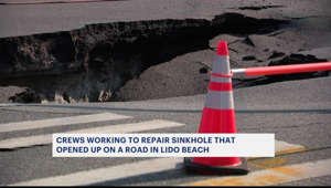 Crews work to repair sinkhole that opened up on Lido Beach road