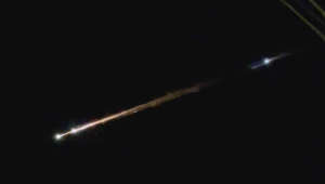 Meteor shower with incredibly long tail streaks across the sky over Philippines