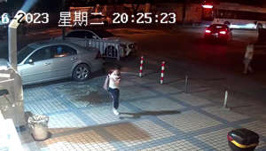 Flowerpot narrowly misses young girl on street