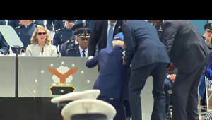 President Joe Biden fell Thursday after handing out diplomas to graduates at the Air Force Academy in Colorado Springs. The president was brought to his feet by three men on the stage soon after the fall.