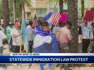 Demonstrators in Downtown West Palm Beach rally against new Florida immigration law