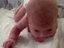 Baby strength: Mother left astonished by crawling three-day-old baby