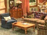 Can you identify these shows based on their living room sets?