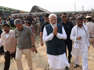 Mr Modi at the crash site on Saturday. Pic: Government of India