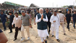 Modi visits worst Indian train disaster in decades