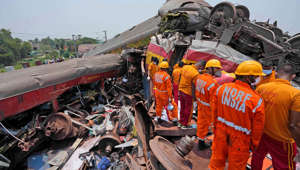 Indian train crash caused by signal error, railway officials say