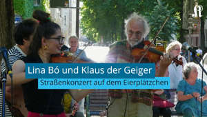 Klaus der Geiger und Lina Bó spielen Straßenkonzert in Köln