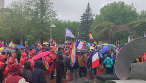 Despite the rain and cold, more than 100 people showed up in Moncton to support Policy 713