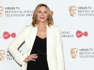 Kim Cattrall has "moved on" from 'Sex and the City' and refuses to be "unhappy" on set when she goes to work.