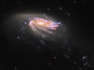 Hubble capta una galaxia con forma de medusa en un abismo cósmico