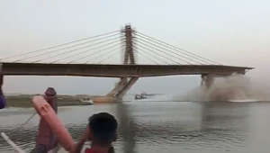 Under-construction bridge collapses into river in northern India