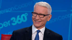 Anderson Cooper gets a surprise on live tv that makes him giggle