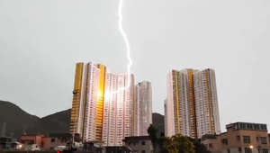 Terrifying moment massive lightning bolt strikes family's apartment