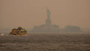 The Statue of Liberty is shrouded in smoke