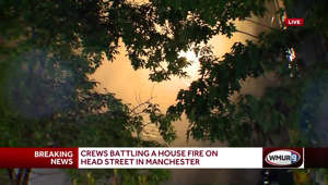 Crews battle house fire on Manchester's West Side