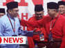 ‘Old friend’ Anwar receives standing ovation at Umno big meet