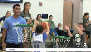 Creighton basketball players connect with kids through camp