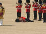 Guardsmen faint under blazing sun