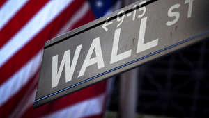 A Wall Street sign is pictured outside the New York Stock Exchange - Carlo Allegri/Reuters A Wall Street sign is pictured outside the New York Stock Exchange in New York, October 28, 2013. Carlo Allegri/Reuters