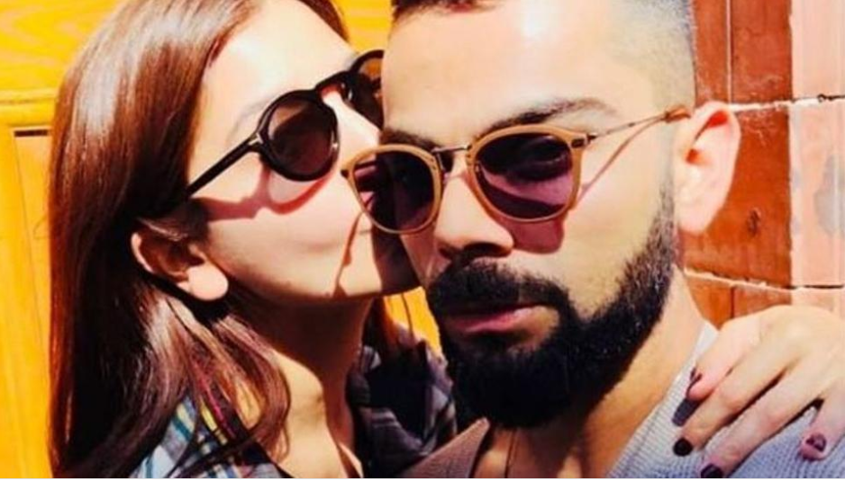 Anushka showers Virat Kohli with