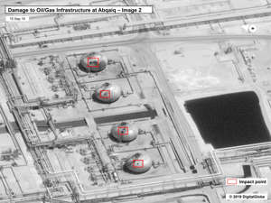 This image provided on Sunday September 15, 2019 by the US Government and DigitalGlobe and annotated by the source shows the damage to the infrastructure of Saudi Aramco's Abaqaiq oil processing facility in Buqyaq, Saudi Arabia. The Saturday drone attack against the Abqaiq factory in Saudi Arabia and its Khurais oilfield has resulted in the interruption of about 5.7 million barrels of production. kingdom's crude oil daily, accounting for more than 5% of the world's daily supply. (US Government / Digital Globe via AP)