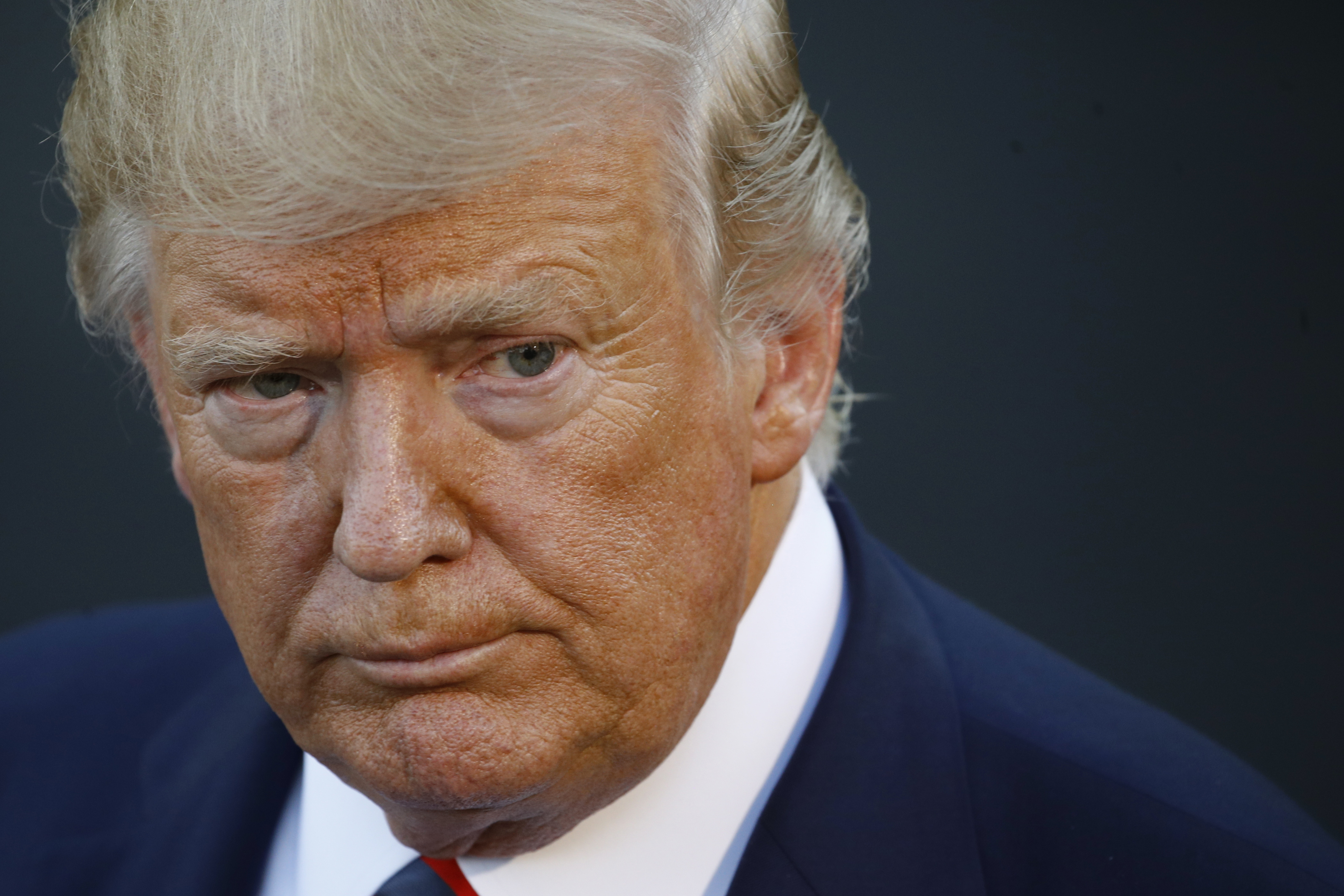 President Donald Trump speaks with reporters before departing on Marine One from the South Lawn of the White House, Thursday, Sept. 12, 2019, in Washington. Trump is en route to Baltimore. (AP Photo/Patrick Semansky)
