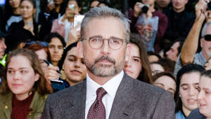 Steve Carell et al. standing in front of a crowd posing for the camera: Back in 2017, Steve Carell let his silver streaks shine through, giving Hollywood's number one silver fox, George Clooney, a run for his money. After debuting his new look, the internet went wild and declared him as a "hottie".  It's fair to say he has gone grey in style!