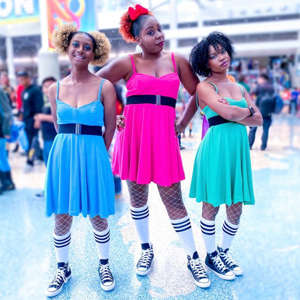 a group of people wearing costumes: Powerpuff Girls Halloween Costume