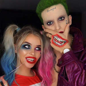 Nina Arsenault wearing a costume posing for the camera: Harley Quinn And The Joker Halloween Costume Courtesy Justjadelauren