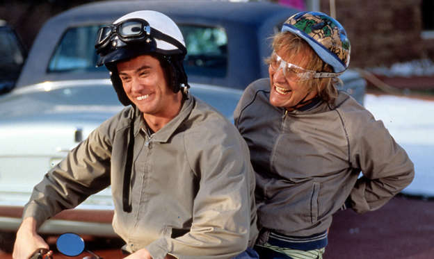 Slide 1 of 25: Dumb and Dumber launched Jim Carrey’s career as a film star! The film is about two idiots who drive cross country in pursuit of a beautiful woman, what happens in between is some of the funniest movie scenes captured on film in the 1990s. Just sit back and watch it!