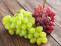 If you've ever lost track of how many grapes you've eaten—which, let's face it, is all too easy to do—you may have experienced a tummy ache. According to Reid, this usually happens because of the high amounts of fructose in grapes (about 12.4 grams per cup, compared to about 3 grams in a cup of raspberries)"Fructose is a natural sugar found in fruits that can cause gas when consumed in high amounts," says Reid. "So, when you eat too many, you may get a stomachache due to the gas. Tannins in grapes may also play a role in an upset stomach: these naturally occurring polyphenols, which are found in the skin and seeds, can cause nausea and diarrhea if eaten in high amounts."Mitri adds that some people who are particularly sensitive to these compounds in grapes may experience bloating, constipation, or diarrhea after eating too many.