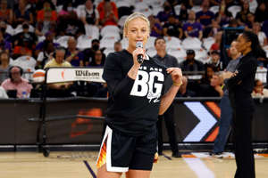 Phoenix Mercury guard Sophie Cunningham speaks to the crowd to honor teammate Brittney Griner before the game against the Las Vegas Aces at Footprint Center.