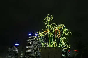 SYDNEY, AUSTRALIA - MAY 25:  A light art work by artist Warren Langley titled 'Vessel of (Horti) Cultural Plenty' is seen against the city skyline during a media preview of the Smart Light Sydney Light Walk from Sydney's Observatory centre, to the Opera House on May 25, 2009 in Sydney, Australia. Vivid Sydney is a unique new public festival of music and light that transformed the city of Sydney into a spectacular living canvas.  (Photo by Sergio Dionisio/Getty Images)