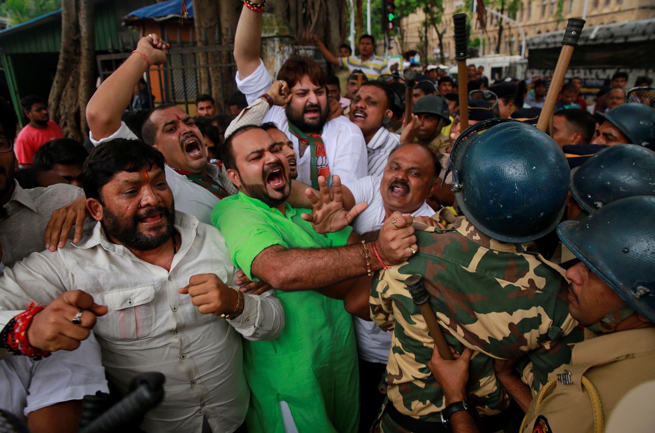 India's Bharatiya Janata Party (BJP) activists supporting death penalty of 1993 Mumbai blasts accused Yakub Abdul Razak Memon, are stopped by police during a protest in Mumbai, India, Wednesday, July 29, 2015.
