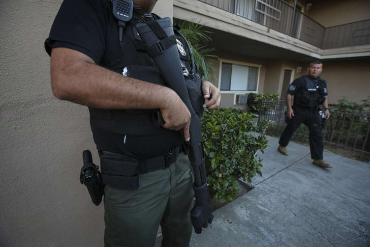 ICE Enforcement and Removal Operations unit raid to apprehend immigrants without any legal status and who may be deportable on Aug. 12, 2015 in Riverside, Calif.